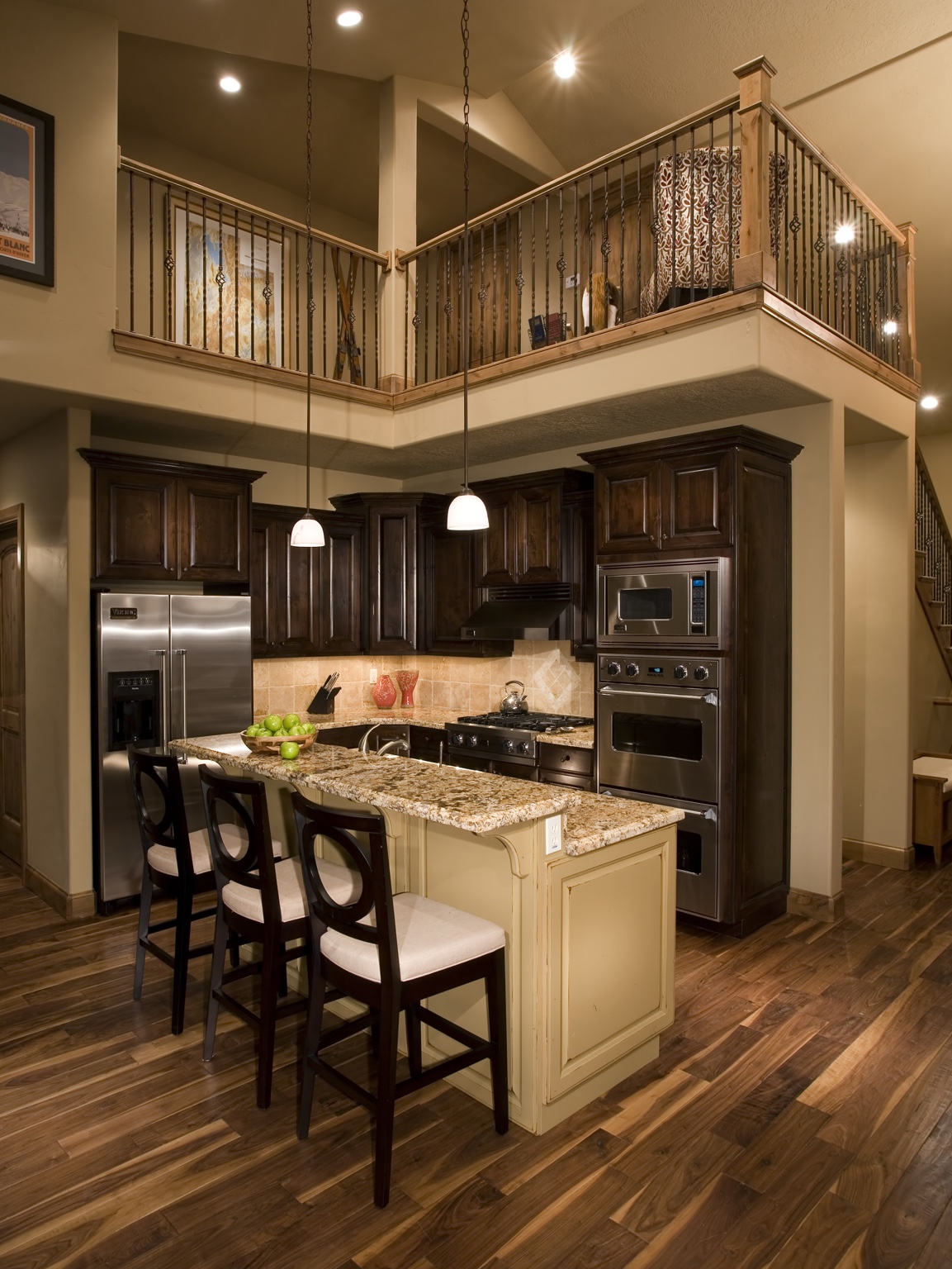 Kitchen with upper-level railing