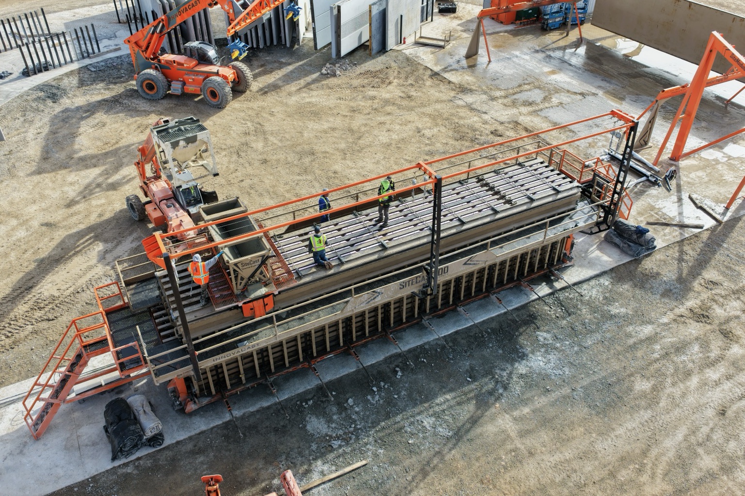 Concrete wall panel being produced in the mobile casting system