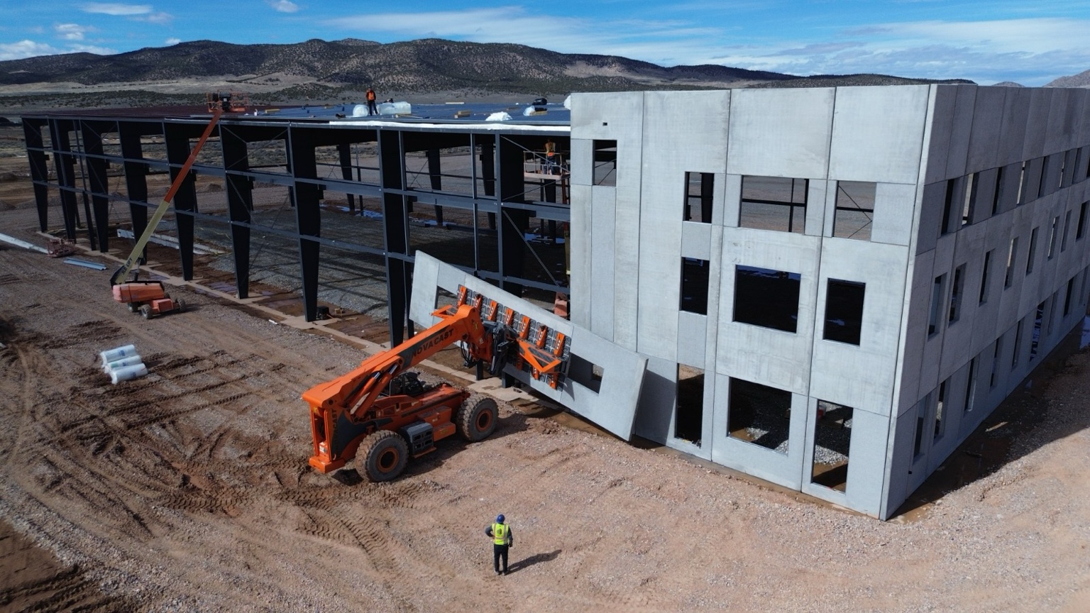 Commercial building progressing through wall-panel installation